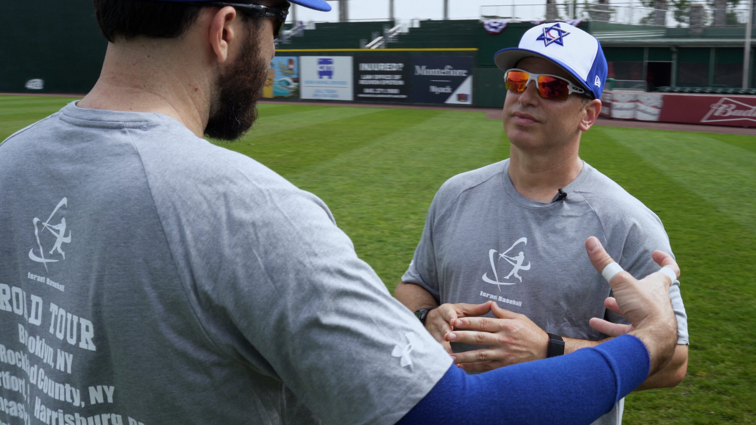 two baseball players chatting